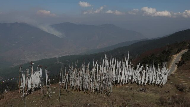 Manidhar prayer flags are raised on behalf of a deceased person,, Paro, Bhutan