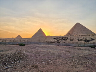 Panoramic sunset with pyramids in Giza, Egypt