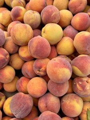 peaches on the market. close up of peaches seen from above - fruit background