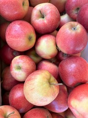 red apples on a market. close up of apples seen from above - fruit background