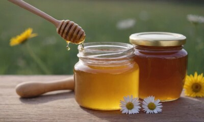 Honey and White Flowers in a Jar