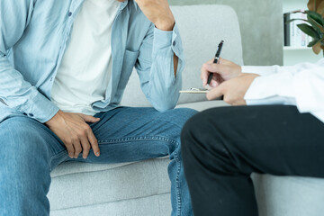 Man hold hand in front of private parts feeling discomfort and consult doctor. Venereal, testicular...