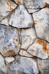 Organic shape rock stone wall. Full frame.