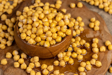 chickpeas porridge with honey during cooking
