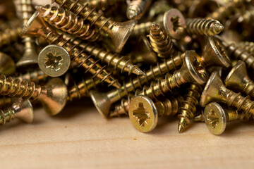 yellow metal self-tapping screws for fixing wooden boards and other wood products