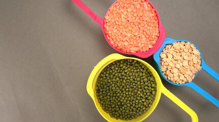 Assorted different types of beans and cereals grains. Set of indispensable sources of protein for a healthy lifestyle. Everyday use at Indian households.