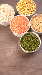 Assorted different types of beans and cereals grains. Set of indispensable sources of protein for a healthy lifestyle. Everyday use at Indian households.