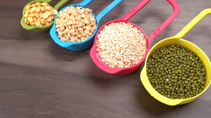 Assorted different types of beans and cereals grains. Set of indispensable sources of protein for a healthy lifestyle. Everyday use at Indian households.