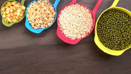 Assorted different types of beans and cereals grains. Set of indispensable sources of protein for a healthy lifestyle. Everyday use at Indian households.
