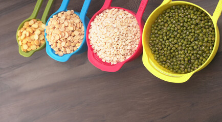 Assorted different types of beans and cereals grains. Set of indispensable sources of protein for a healthy lifestyle. Everyday use at Indian households.