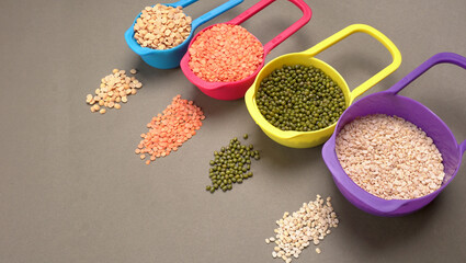 Assorted different types of beans and cereals grains. Set of indispensable sources of protein for a...