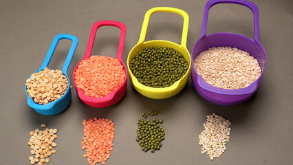 Assorted different types of beans and cereals grains. Set of indispensable sources of protein for a...