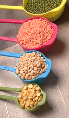 Assorted different types of beans and cereals grains. Set of indispensable sources of protein for a healthy lifestyle. Everyday use at Indian households.