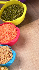 Assorted different types of beans and cereals grains. Set of indispensable sources of protein for a healthy lifestyle. Everyday use at Indian households.