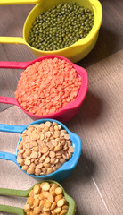 Assorted different types of beans and cereals grains. Set of indispensable sources of protein for a healthy lifestyle. Everyday use at Indian households.