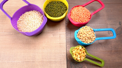Assorted different types of beans and cereals grains. Set of indispensable sources of protein for a healthy lifestyle. Everyday use at Indian households.