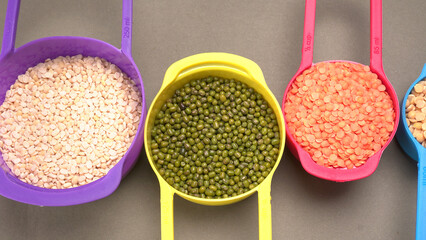Assorted different types of beans and cereals grains. Set of indispensable sources of protein for a...