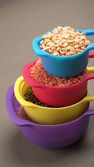 Assorted different types of beans and cereals grains. Set of indispensable sources of protein for a healthy lifestyle. Everyday use at Indian households.