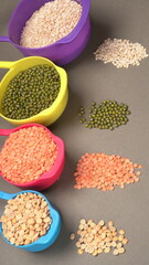 Assorted different types of beans and cereals grains. Set of indispensable sources of protein for a healthy lifestyle. Everyday use at Indian households.