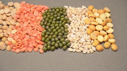 Assorted different types of beans and cereals grains. Set of indispensable sources of protein for a healthy lifestyle. Everyday use at Indian households.
