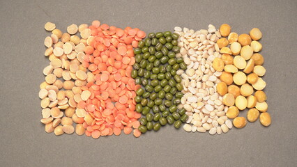 Assorted different types of beans and cereals grains. Set of indispensable sources of protein for a healthy lifestyle. Everyday use at Indian households.