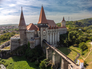 Naklejka premium Aerial drone view of the iconic Hunedoara Castle, a Medieval Fortress in Romania