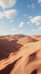 Naklejka premium The image depicts an expansive desert landscape with rolling sand dunes under a bright blue sky. The sand dunes vary in size and cast soft shadows, creating a rich texture and depth. The sky above is 