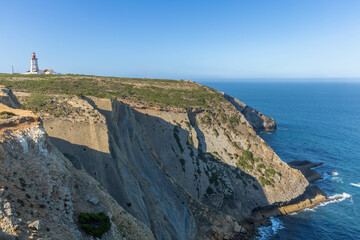 Lighthouse Cabo Espichel with cliff and ocean Sesimbra.