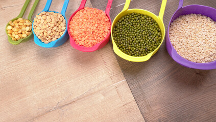 Assorted different types of beans and cereals grains. Set of indispensable sources of protein for a healthy lifestyle. Everyday use at Indian households.