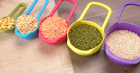 Assorted different types of beans and cereals grains. Set of indispensable sources of protein for a...