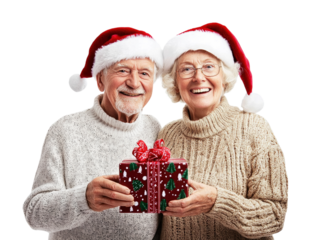 Elderly couple in Santa hats holding a Christmas gift, celebrating joyfully, isolated on white. PNG transparent.