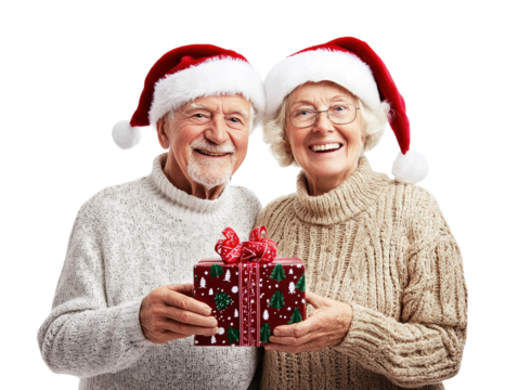 Elderly couple in Santa hats holding a Christmas gift, celebrating joyfully, isolated on white.  PNG transparent. - Powered by Adobe