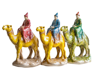 Three camel figurines with riders in a row, detailed, isolated on a white background.  PNG transparent.