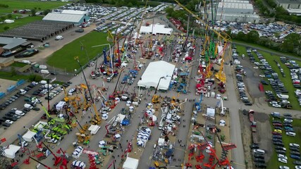 Construction industry event showing cranes and equipment exhibiting