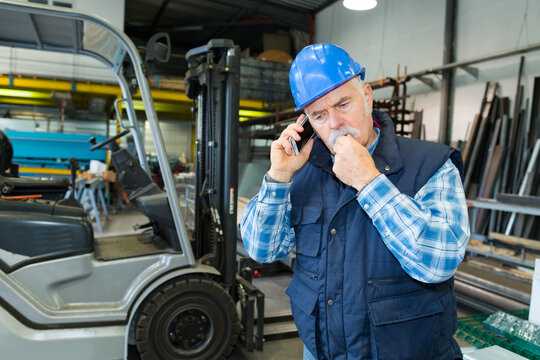 portrait of industrial construction material worker - Powered by Adobe