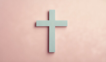 Obraz premium Christian cross on a pastel colored paper textured background with copy space