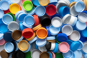 close up plastic bottles caps for recycling to conserve the environment, recycling, reuse, garbage disposal, save the world concept