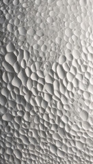 Naklejka premium a 4K background featuring a smooth, white ceramic surface with soft shadows, ideal for clean, minimalist apparel photography.