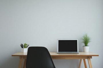 A minimalist wooden desk features a laptop in the center and two potted plants on either side, creating a simple yet modern workspace setup with a calming aesthetic.