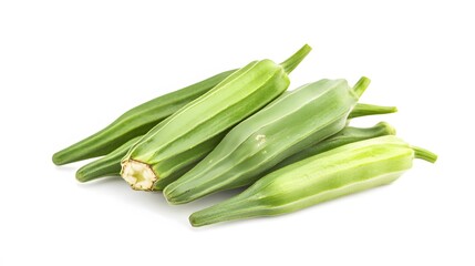 Obraz premium Realistic close-up of fresh okra pods on a white background, highlighting their green, ribbed texture and slightly tapered shape