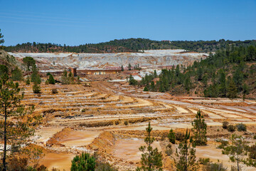 Obraz premium This mine is located in Riotinto, Huelva, Spain. This area along the Rio Tinto, in the Andalusian, Spain has been mined for copper, silver, gold, and other minerals. Rio Tinto with red water