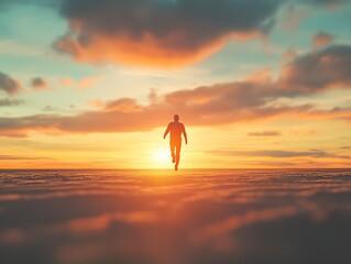 A man runs toward the glowing horizon as the sun sets, creating a stunning sky with warm hues of orange and yellow, symbolizing motivation and freedom.