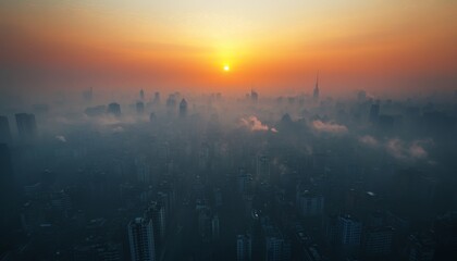 A breathtaking sunset casts a warm glow over a vast, foggy cityscape, creating a serene yet mysterious atmosphere.