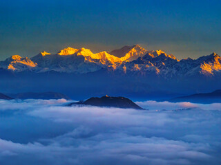 sunrise over the mountains near Gumbadara viewpoint near Tinchuley, West Bengal, India