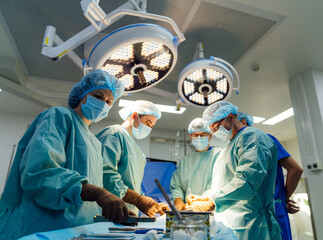 Surgical team in delicate operation. A dedicated surgical team is focusing on a complex procedure...