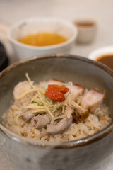 Dry rice porridge. Dry rice congee with pork. Famous food in Phuket Thailand.