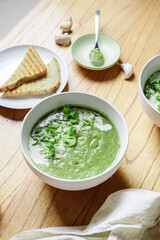 broccoli puree soup with cream and pesto