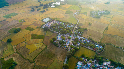 Surrounded by trees, the view from the top of the road is a beautiful picture