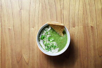 broccoli puree soup with cream and pesto