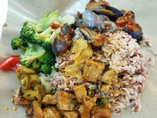 mixed vegetarian cuisine with brown rice